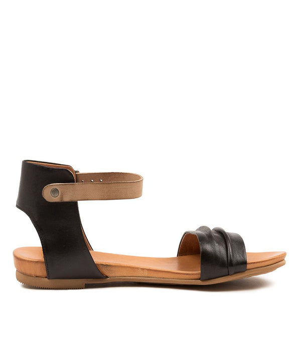 www.ivyandgrace.com.au The Larni has been masterfully crafted by Portuguese shoemakers, and it sports rich colours and a bold look. This flat sandal features a durable leather strap to keep it from slipping while you walk, and the soft footbed of exquisite calf leather ensures your comfort all day long.