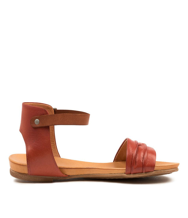 available at www.ivyandgrace.com.au The Larni has been masterfully crafted by Portuguese shoemakers, and it sports rich colours and a bold look. This flat sandal features a durable leather strap to keep it from slipping while you walk, and the soft footbed of exquisite calf leather ensures your comfort all day long.