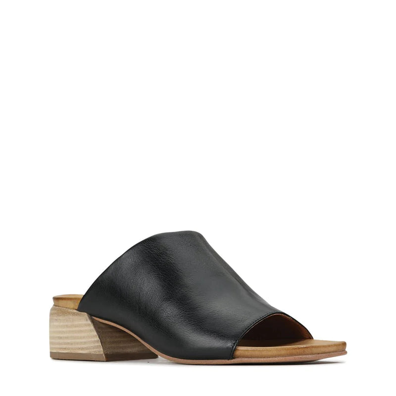There’s something undeniably chic about Salma, a pair of heeled slides draped in soft, buttery leather. Set on a charming wooden heel, these stylish sandals have hidden elastic for a flexible fit and a slightly squared toe that leans into contemporary styles. Meanwhile, the luxurious leather has a wonderfully organic texture for a truly timeless finish.