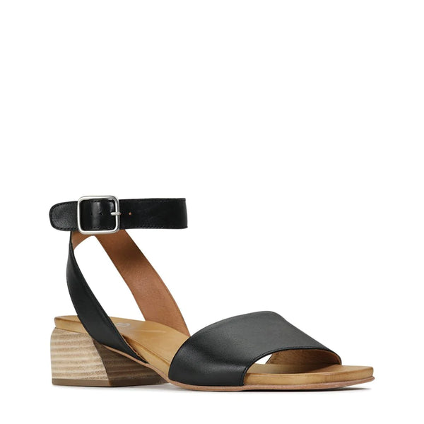 Simple to implement into any evening ensemble, Sariah has a polished profile that helps you feel elegantly put together. These low block heel sandals are fastened with a smart silver buckle, while luxurious leather straps cross gracefully at the back of the ankle. Poised on a graceful wooden heel for a refined level of elevation.