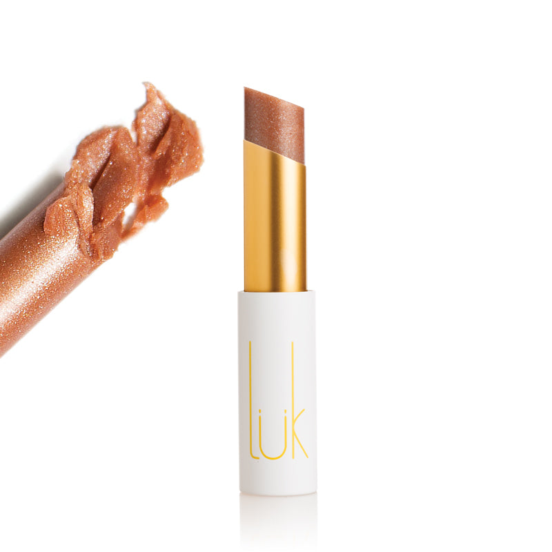 100% Natural, Toxin Free and Made from Food.  Creme-soft lustrous lipstick feeds and moisturises lips for a healthy natural look.  Almost colourless warm golden beige with an understated gentle gold shimmer to highlight lips.  Subtly flavoured with organic cold pressed cinnamon, vanilla and spice oils.available at www.ivyandgrace.com.au